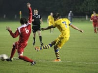 Town go top as Macca finds his melody