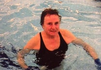 Mayor takes to the pool for sponsored swim