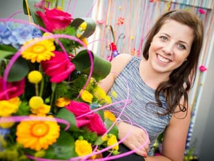 Florist Charlotte arranges a tilt at the title