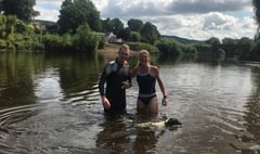 Local MP joins Greenpeace activist for a dip in the Usk to highlight plastic plight