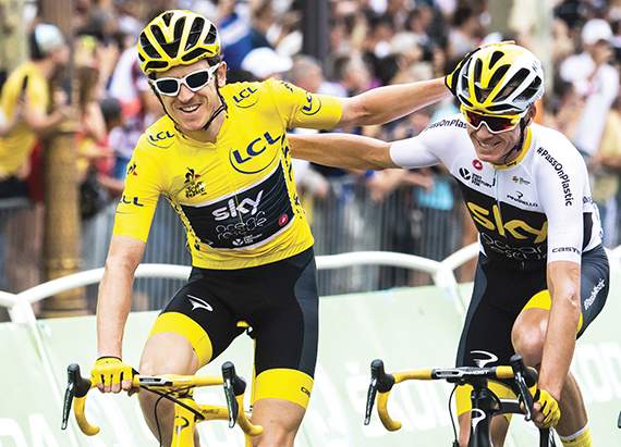 Geraint Thomas and Chris Froome celebrate finishing the Tour de France