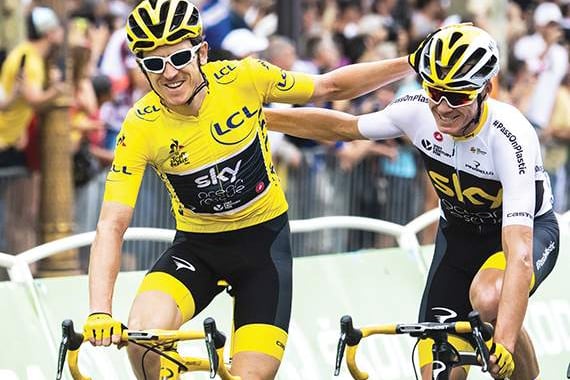 Geraint Thomas and Chris Froome celebrate finishing the Tour de France