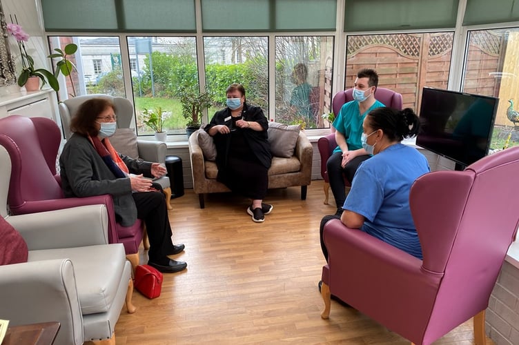 Deputy Minister for Social Services Julie Morgan meeting with (from left) Home Manager Debbie Richards, care assistant Craig Burrows and senior carer Emma Corten at Fields Care Home in Newport