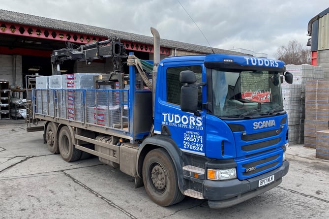 The acquisition of Tudors Building Supplies  is celebrated by Abergavenny bases Robert Price builders merchants