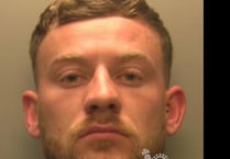 Armed robber jailed over knee cap threat