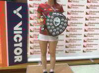 Badminton player retains top titles