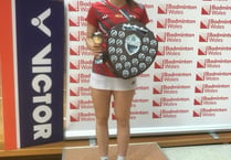 Badminton player retains top titles