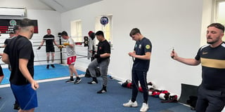 Celebrations as top fighter opens new boxing gym