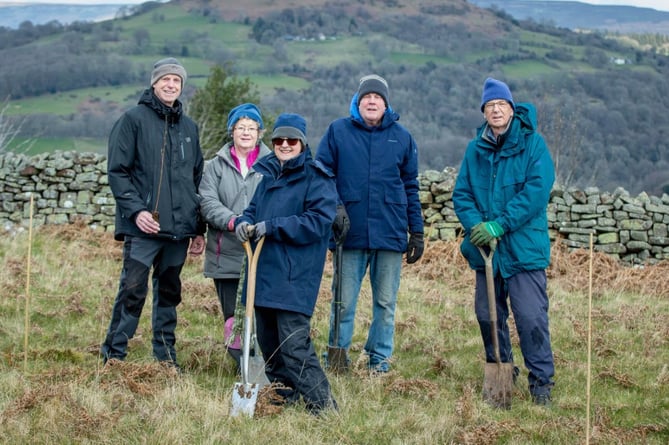 Gilwern u3a members tree planting on the Brecon Beacons