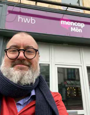 Wayne Crocker on a recent visit to a building
based day service run by Mencap Mon on Anglesey
