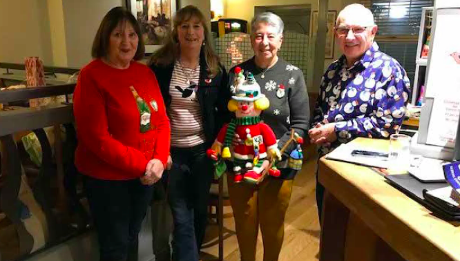 Crafting 4 Cancer group members, Shirley Hughes-Jones, Karen Smith and Maurine Barrett with Grofield landlord, Andrew Powell.