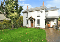"Picturesque"  Victorian cottage for sale sits beside babbling brook