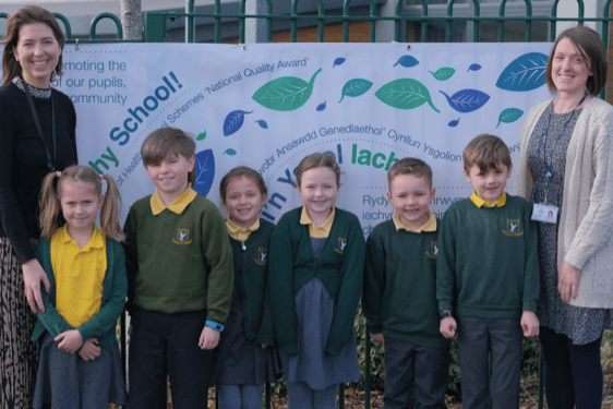 Photo: L-R: Head Teacher, Sue Marles, with pupils and teacher Katie Brocklehurst who all worked together to secure the Health School status
