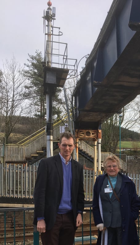 David Davies MP with Cty Cllr Maureen Powell at Abergavenny Railway Station.