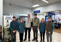 Raglan boy Scouts team up with David Davies MP for sponsored abseil