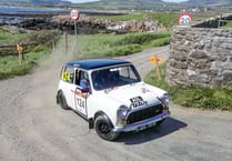 It’s Mini the Manx for dad and daughter!