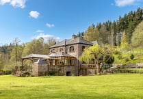 Former mill for sale comes with its own water wheel and woodlands 