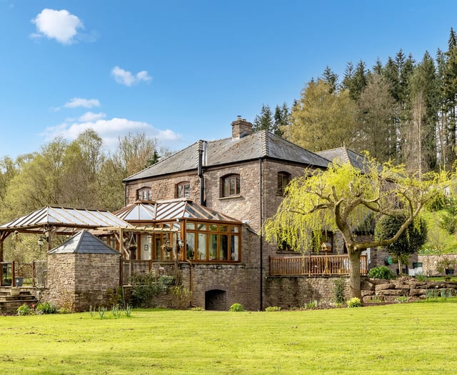 Former mill for sale comes with its own water wheel and woodlands 