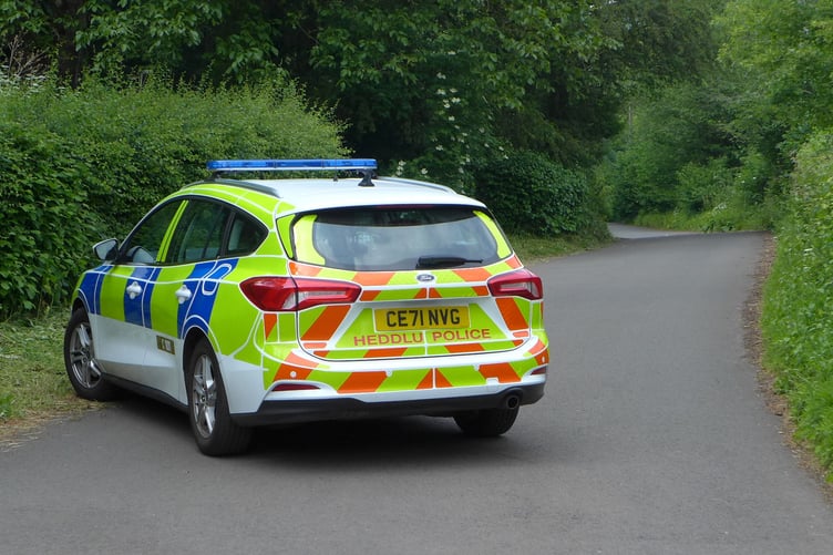 A police car blocks Forge Road near Tintern during the investigation in July 2023