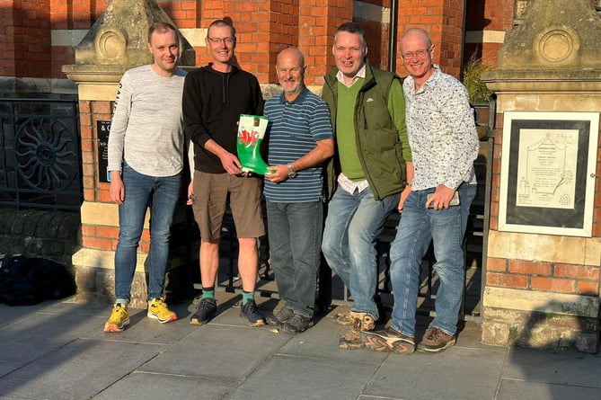 From left, Dave Thorne (Wellington), Simon Buttars (Wellington), Gary Hortop (Aber), Peter Shaw (Wellington), Mike Logan (Aber) with the 'Welly' 