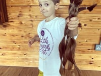Brave brothers chop off 28 inches of hair for charity