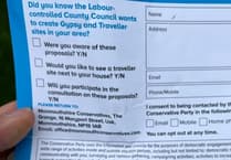 Deputy PM defends MP David Davies over gypsy leaflet reported to police