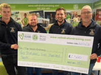 Raglan Young Farmers hand over cash to charity