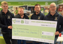 Raglan Young Farmers hand over cash to charity