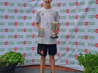 Tennis ace Max, 13, takes it to the Max