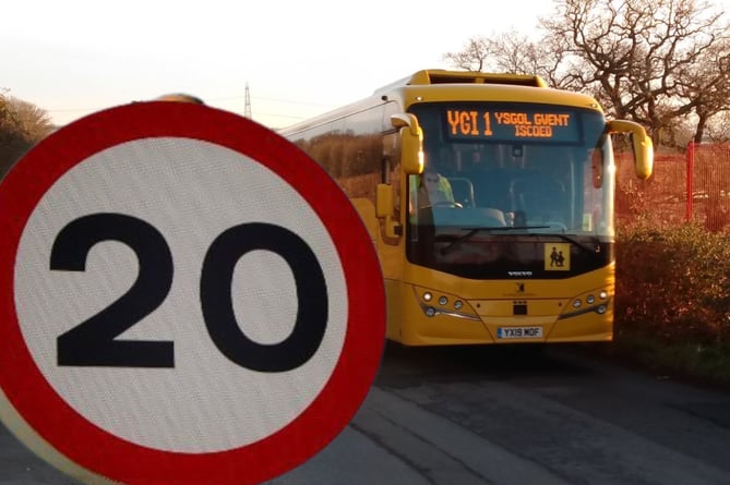 A 20 mile per hour sign and a school bus. Picture: LDRS