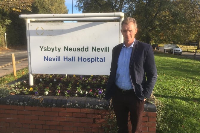 David Davies MP outside Nevill Hall Hospital in Abergavenny.