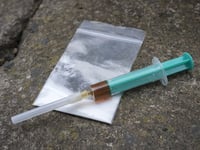 Three arrested in raids on properties
