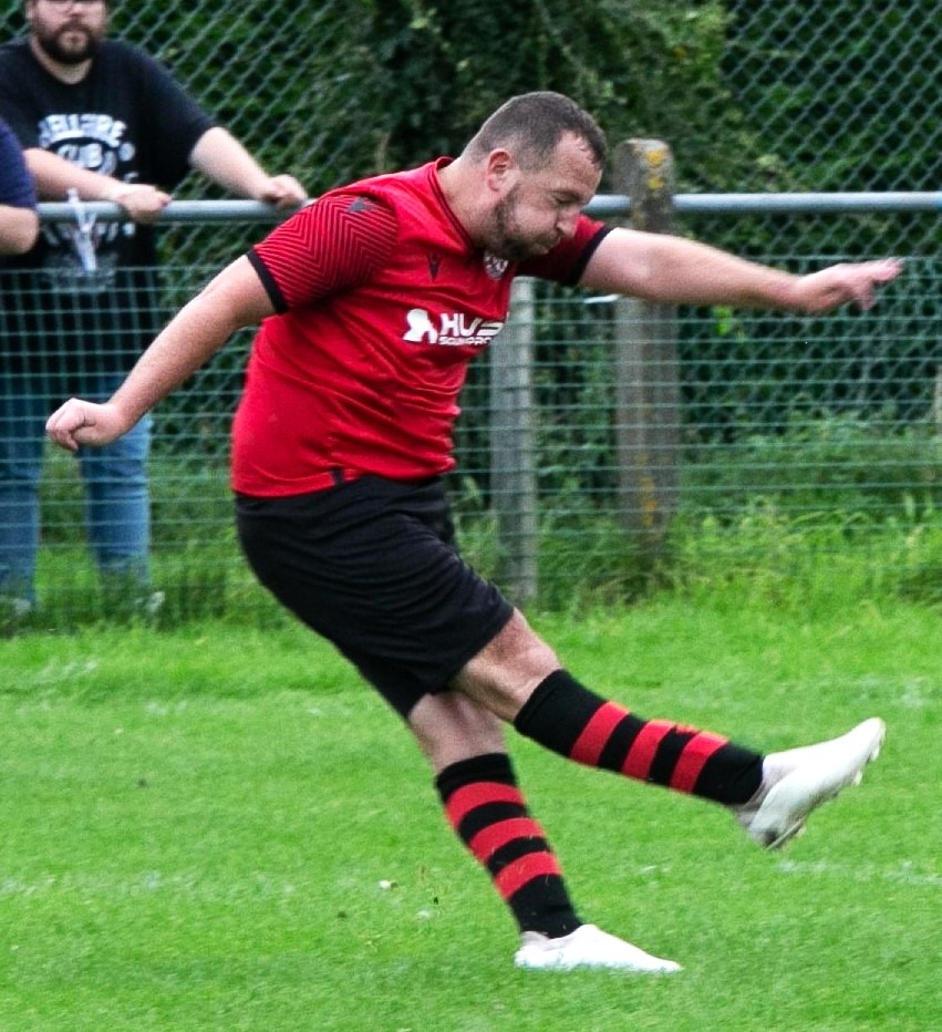 Storming Norman hits two in battling 2-2 Mardy draw