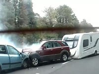 PC caused head-on crash while overtaking with caravan