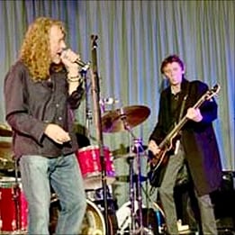 Paul Martinez, right, playing with Robert Plant at a charity gig at Monmouth's Bridges