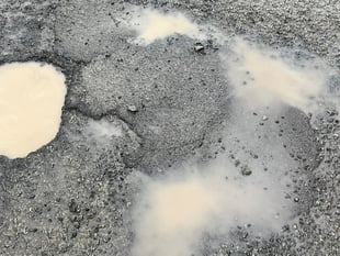 Councillors call for more money to potholes