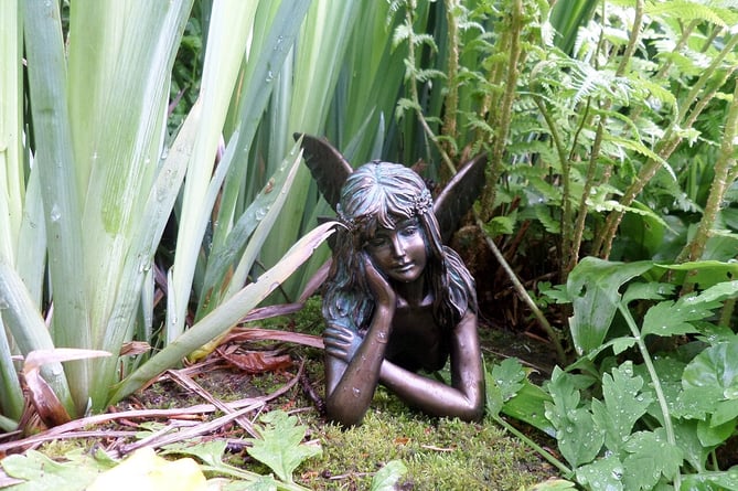 A fairy in a garden