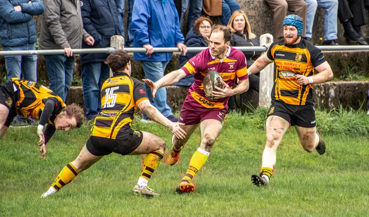 Anthony Squire makes a try-scoring break for Abergavenny
