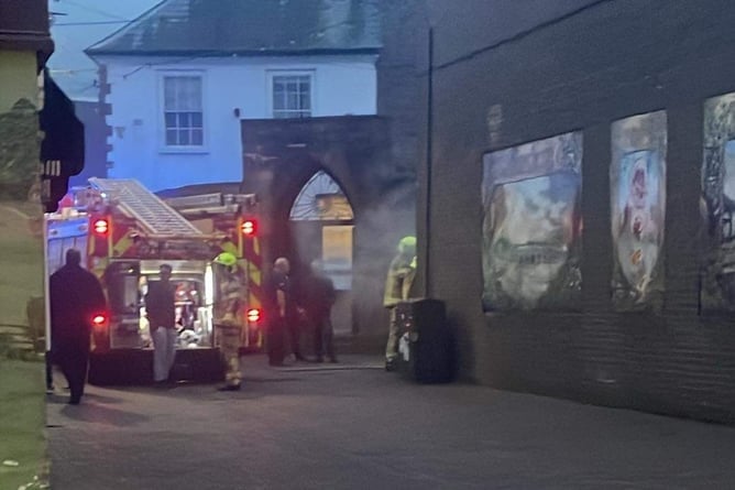 A fire crew tackles the bin fires in the St John's Lane area of Abergavenny
