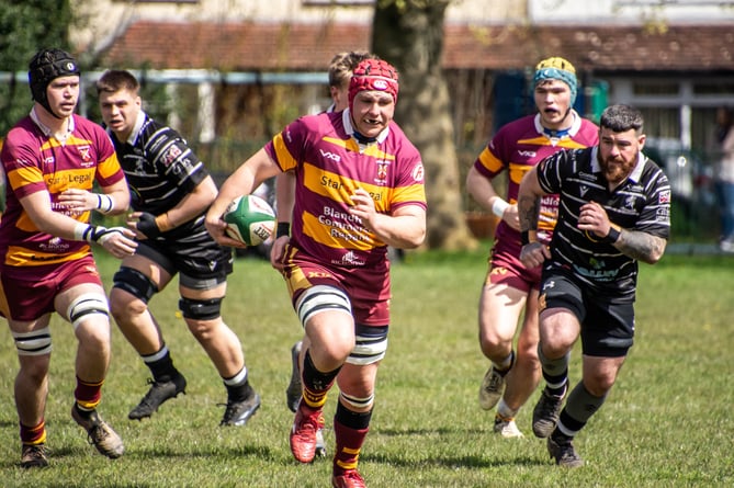 Abergavenny scored five tries in an entertaining game in the sunshine