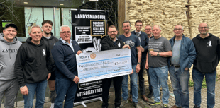 Local group tackle Pen y Fan for men’s mental health charity 
