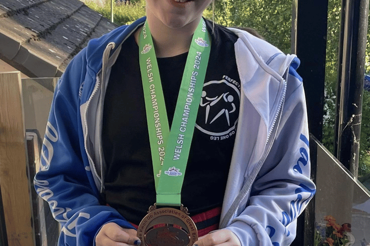 Niall Farr with his medal