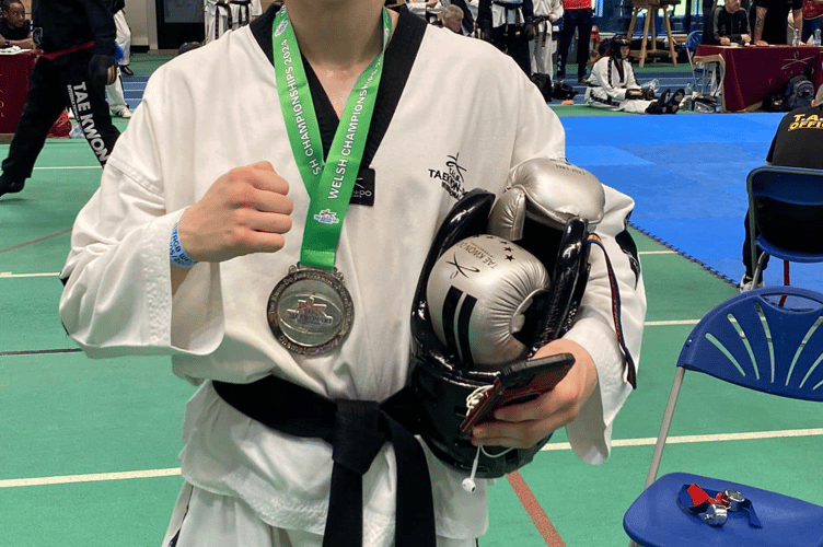 Niall Farr with his medal