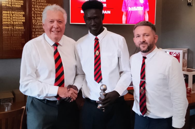 Best Mardy FC newcomer went to Musab Hussein, presented by Clive Harry left, and coach James Copeman