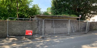 

Should this old bus shelter be put out of its misery? 
