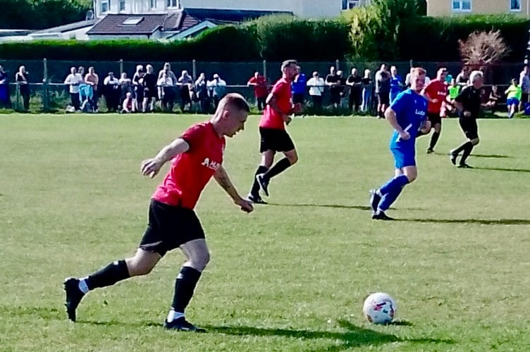 Nathan Price crosses for Ross Melrose to score against Nantyglo