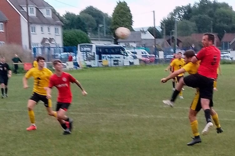 Aaron Norman heads across goal for Ton Jenkins to score