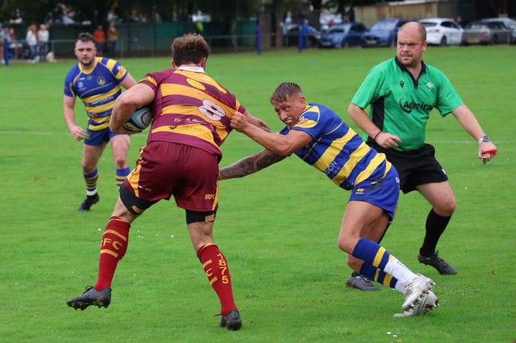 Rob Dudley-Jones tries to break through for Abergavenny