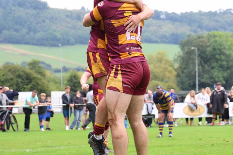 Abergavenny players celebrate a hard-earned victory