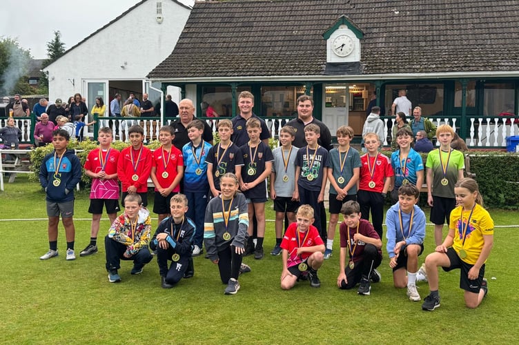 Youngsters with Glamorgan's Ben Morris and  their awards at Abergavenny CC